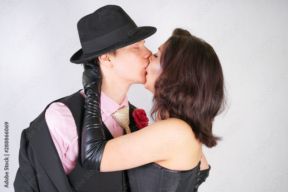 Happy couple in love hug each other on white studio background Happy couple in love hug each other on white studio background