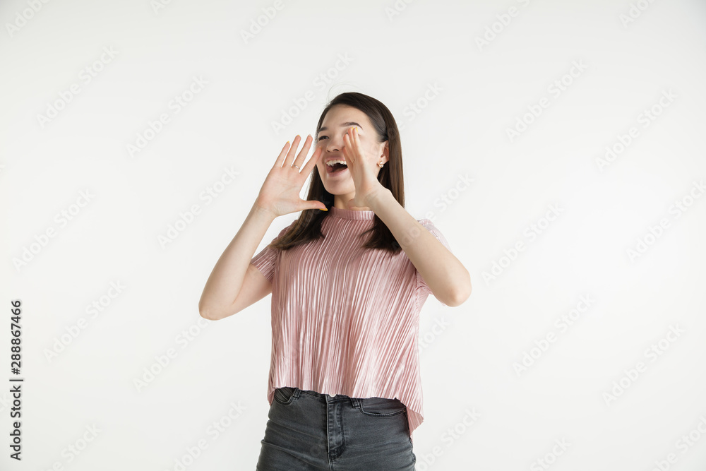 Beautiful female half-length portrait isolated on white studio background. Young emotional woman in casual clothes. Human emotions, facial expression concept. Astonished, wondered, calling for sales. Beautiful female half-length portrait isolated on white studio background. Young emotional woman in casual clothes. Human emotions, facial expression concept. Astonished, wondered, calling for sales.