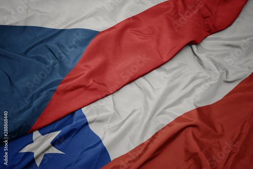 waving colorful flag of chile and national flag of czech republic.