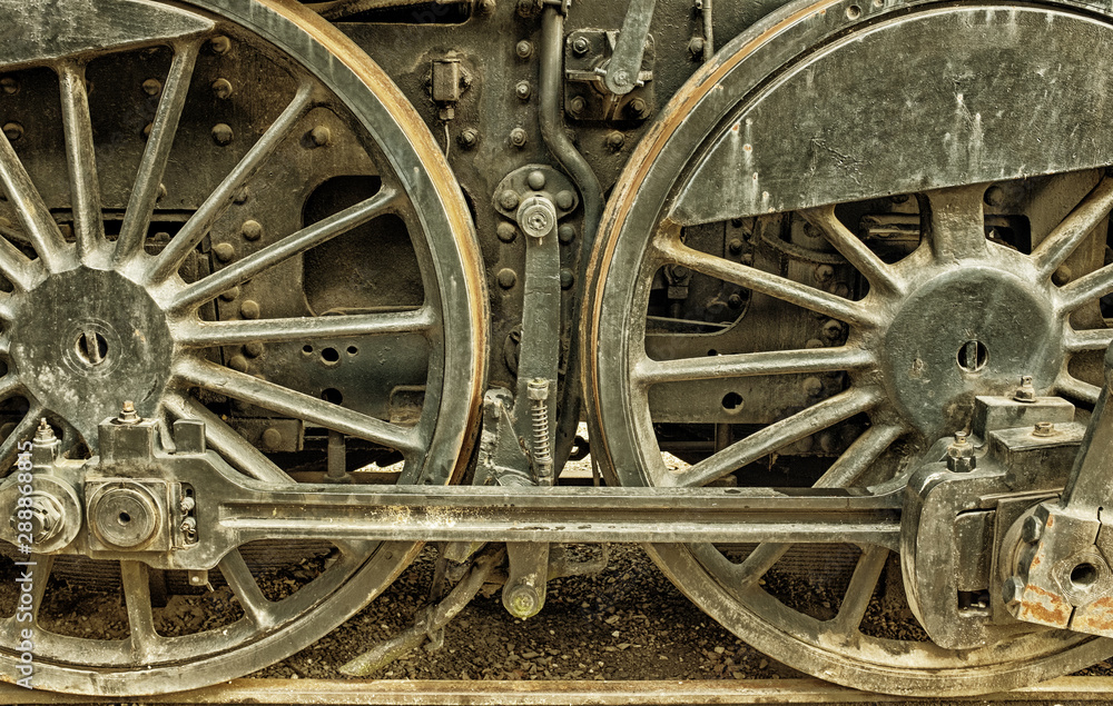 Wheel details of a steam engine for technology art backgrounds