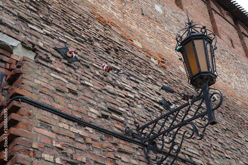 old street lamp on wall