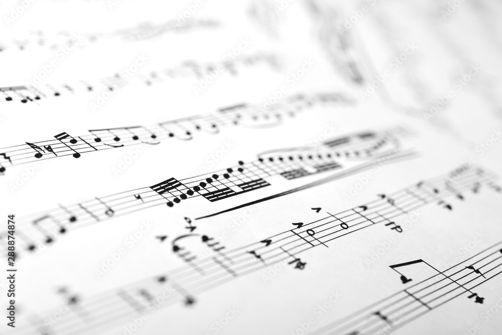 Sheets with musical notes closeup as a background Sheets with musical notes closeup as a background