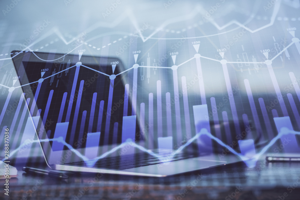 Stock market graph on background with desk and personal computer. Double exposure. Concept of financial analysis. Stock market graph on background with desk and personal computer. Double exposure. Concept of financial analysis.