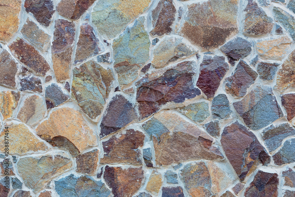 A rock. Granite stone. background. Close-up. A rock. Granite stone. background. Close-up.