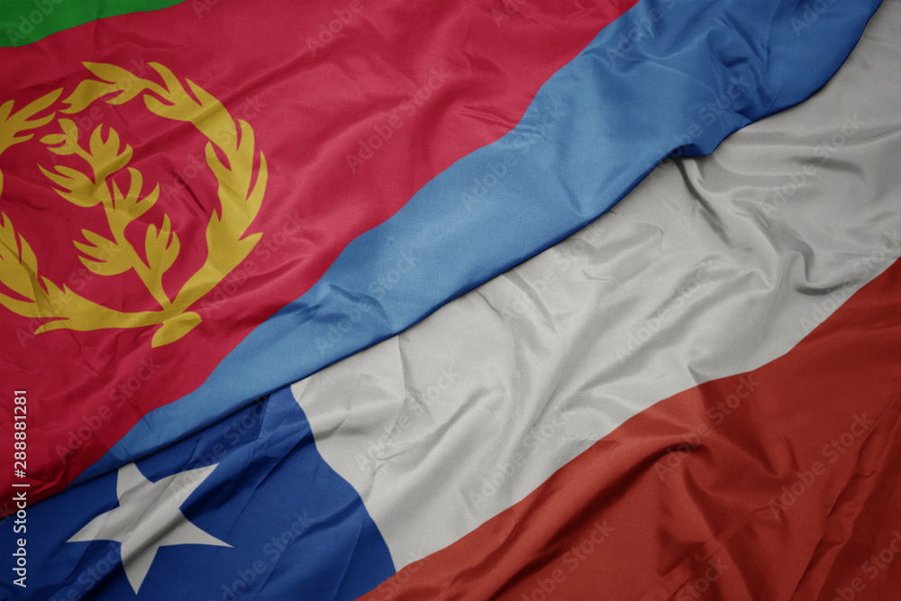 waving colorful flag of chile and national flag of eritrea. waving colorful flag of chile and national flag of eritrea.