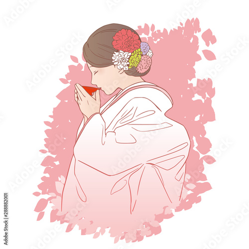 三献の儀（三々九度）でお酒を飲む花嫁