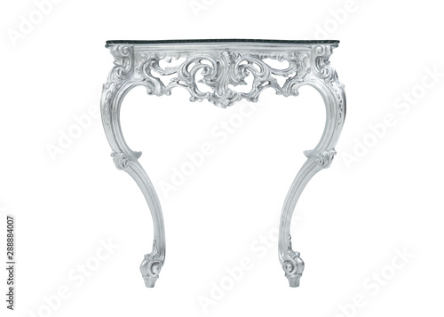 Rocco Baroque table on a white background. Beautiful patterns on expensive furniture. Handmade carved furniture. A table made of carved wood in the style of the Rocco Baroque. photo