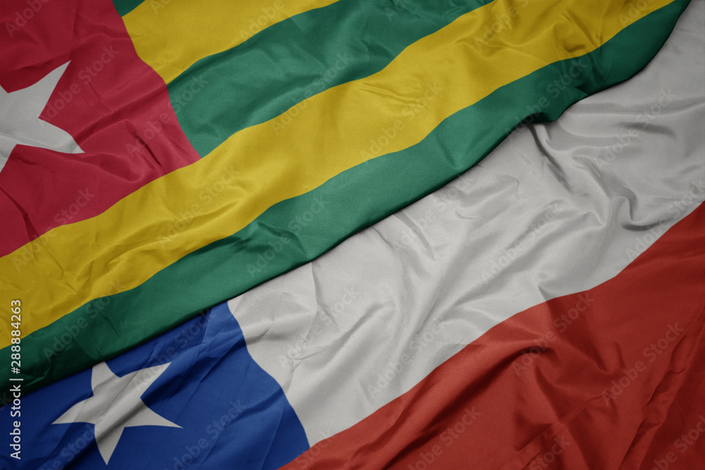 waving colorful flag of chile and national flag of togo.
