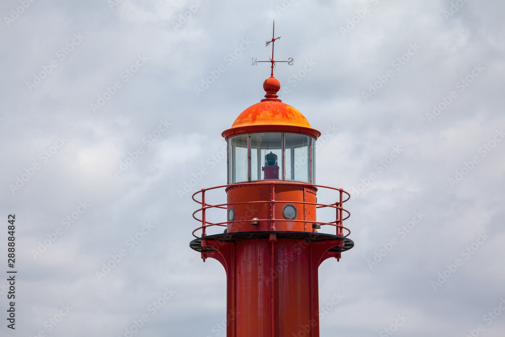 close up image of red lighthouse 