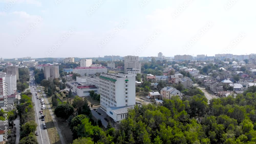 Aerial shooting of city and lake from the quadrocopter. City and lake from the bird's-eye view.. 4k. Beautiful city with aerial view. City panorama in summer. Aerial shooting of city and lake from the quadrocopter. City and lake from the bird's-eye view.. 4k. Beautiful city with aerial view. City panorama in summer.
