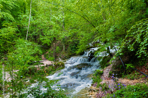 great fluidity of water in the Tobera waterfalls, in the Basque country photo