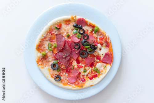 homemade pizza on white plate