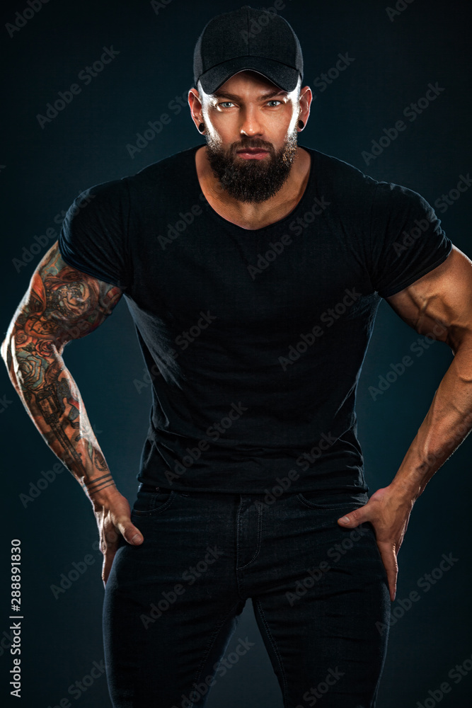 Strong and fit man bodybuilder. Sporty muscular guy athlete. Sport and fitness concept. Men's fashion. Strong and fit man bodybuilder. Sporty muscular guy athlete. Sport and fitness concept. Men's fashion.