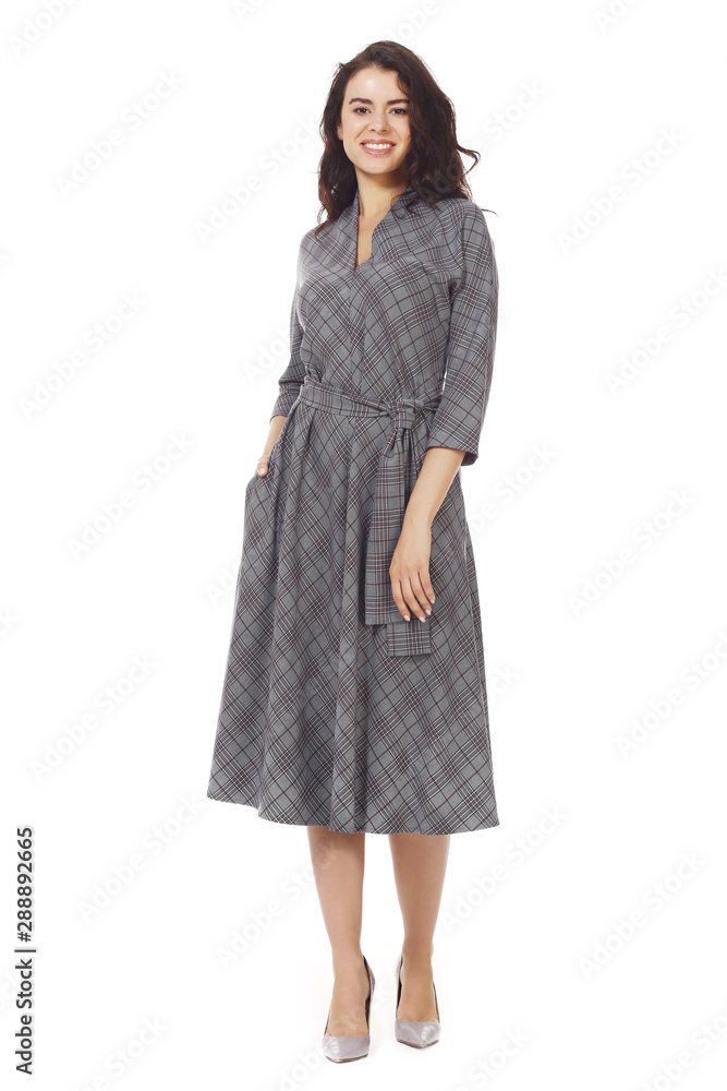 young caucasian business woman executive posing in official checkered dress dress young caucasian business woman executive posing in official checkered dress dress