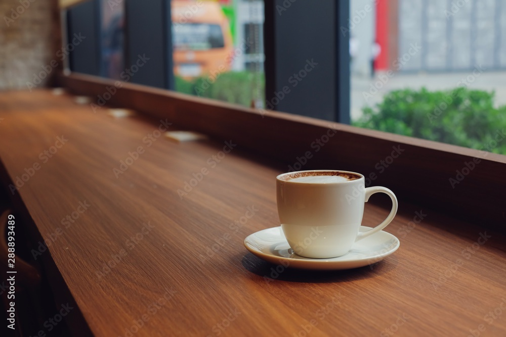 cup of coffee on table in cafe