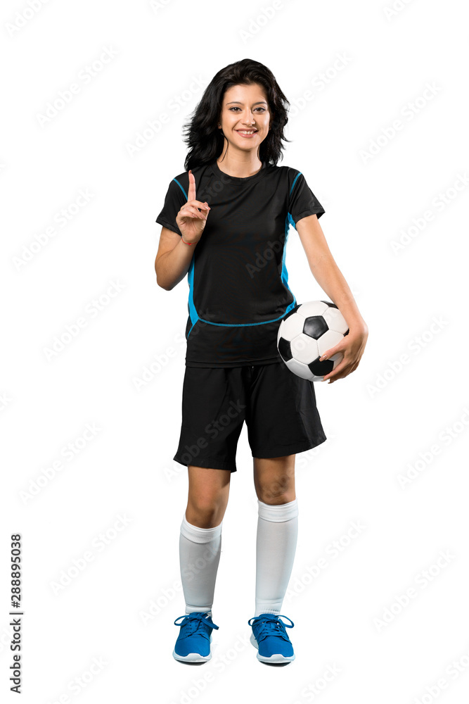 A full-length shot of a Young football player woman pointing up a great idea over isolated white background A full-length shot of a Young football player woman pointing up a great idea over isolated white background