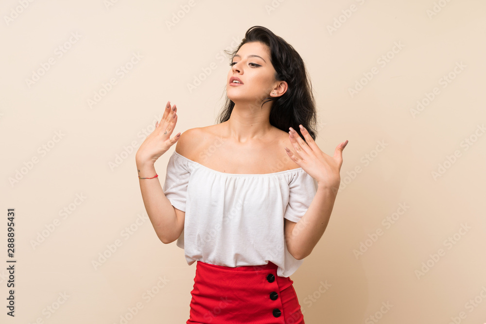 Young woman over isolated background with tired and sick expression Young woman over isolated background with tired and sick expression