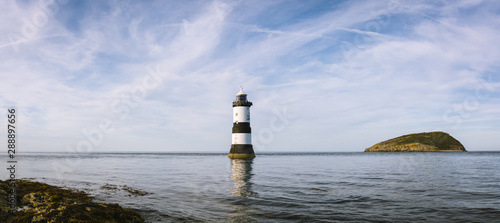 Seascape view from Penmon Point Anglesey North Wales with the Trwyn Du lighthouse and Puffin Island photo