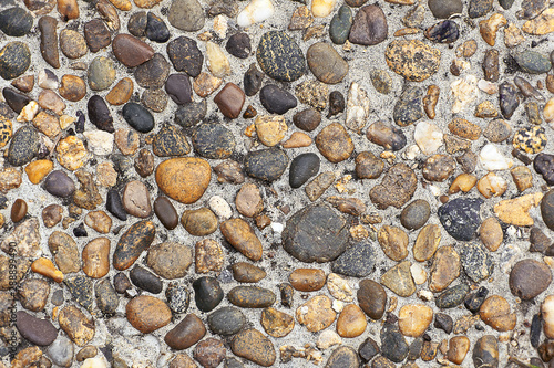background natural stone rounded pebbles gray-brown tones