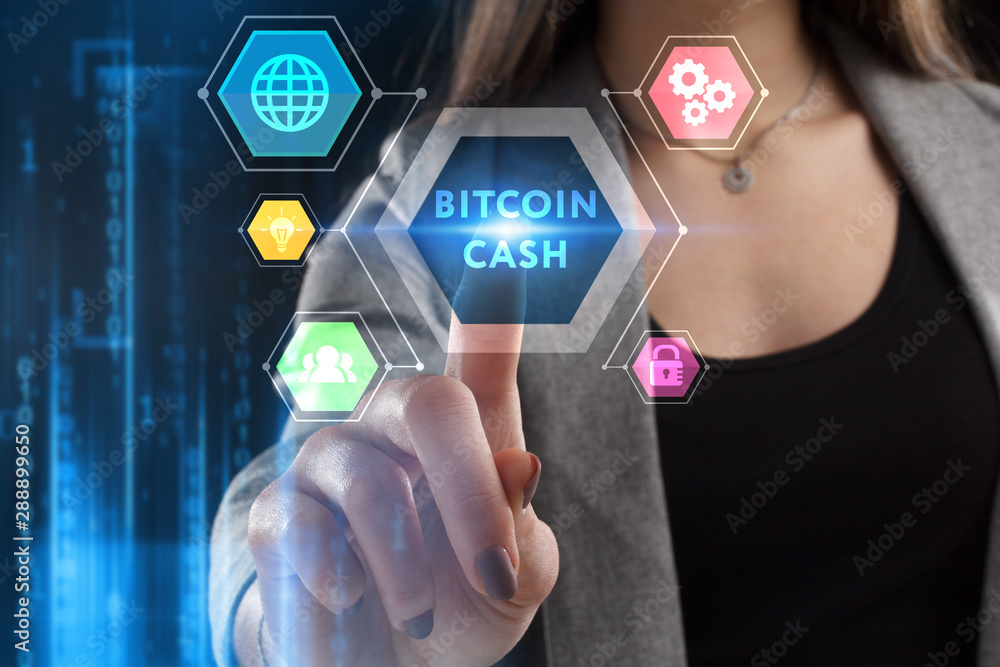 The concept of business, technology, the Internet and the network. A young entrepreneur working on a virtual screen of the future and sees the inscription: Bitcoin cash The concept of business, technology, the Internet and the network. A young entrepreneur working on a virtual screen of the future and sees the inscription: Bitcoin cash