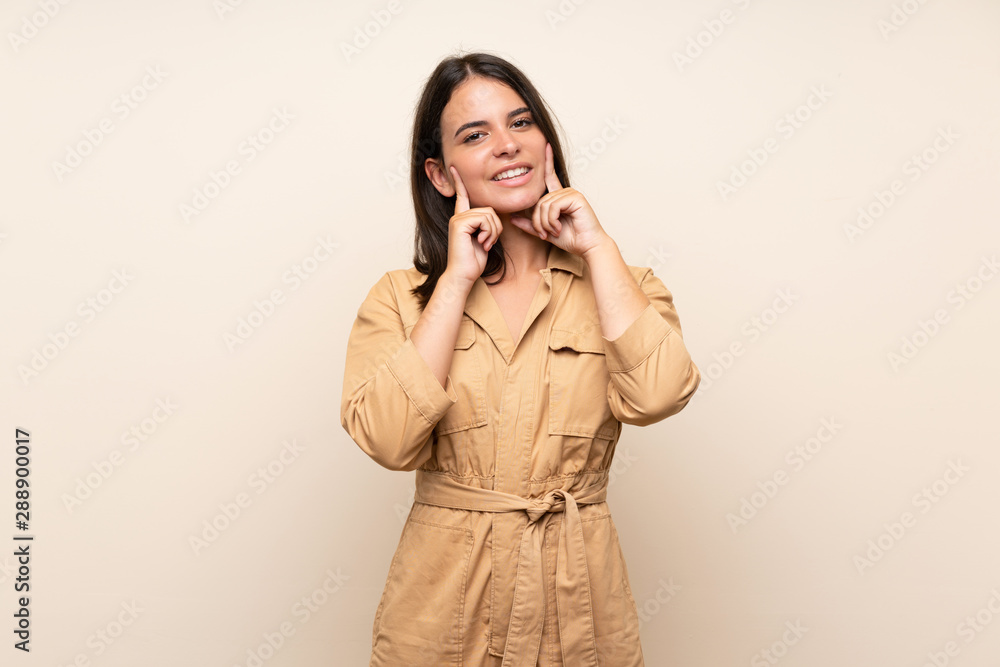 Young girl over isolated background smiling with a happy and pleasant expression Young girl over isolated background smiling with a happy and pleasant expression
