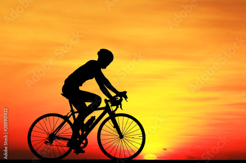 Wallpaper Mural Silhouette  Cycling  on blurry sunrise  sky   background. Torontodigital.ca