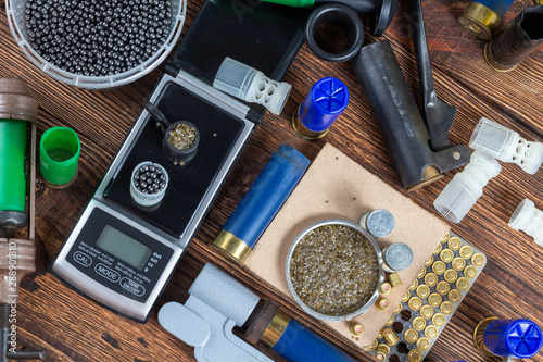 Canvas Print reloading process shotgun shells with special reload equipment