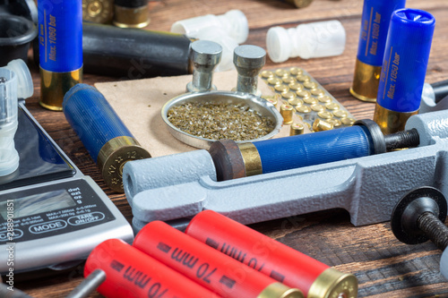 Canvas Print reloading process shotgun shells with special reload equipment