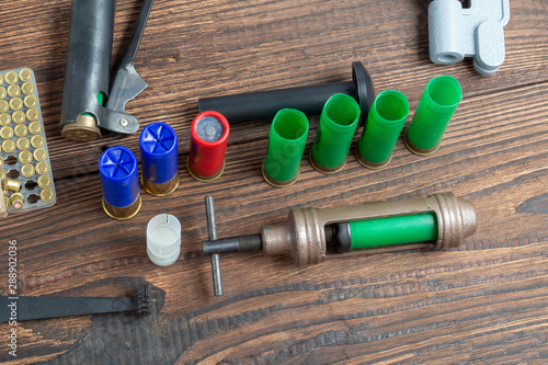 Canvas Print reloading process shotgun shells with special reload equipment