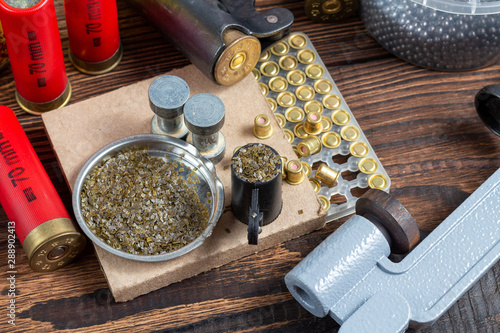 Canvas Print reloading process shotgun shells with special reload equipment