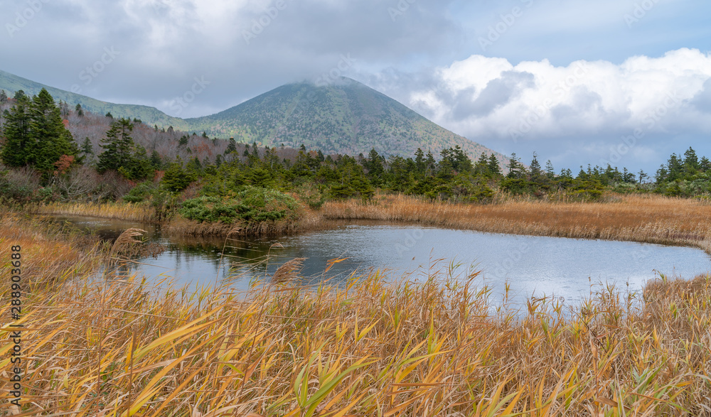 Suiren numa pond and Mt. Takadaohdake in Towada-Hachimantai national park during autumn season.