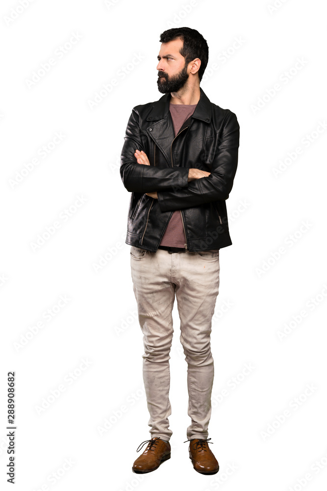 Handsome man with beard with confuse face expression over isolated white background Handsome man with beard with confuse face expression over isolated white background
