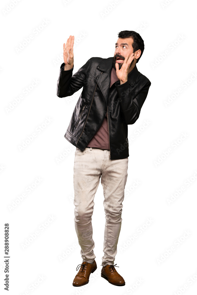 Handsome man with beard nervous and scared over isolated white background Handsome man with beard nervous and scared over isolated white background
