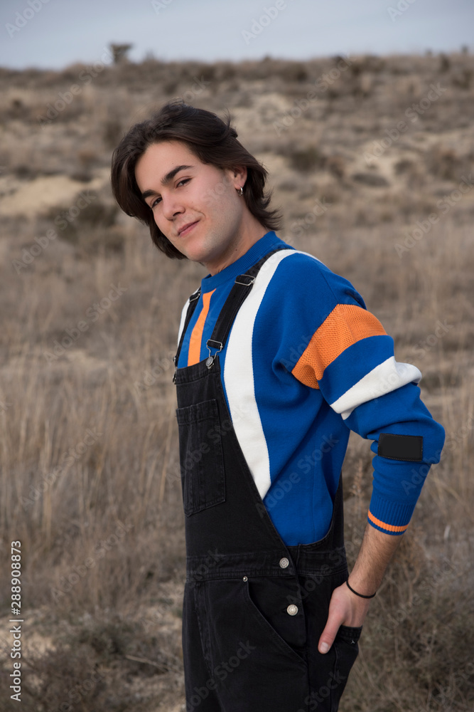 Fototapeta premium YOUNG MAN WITH STRIPED JERSEY