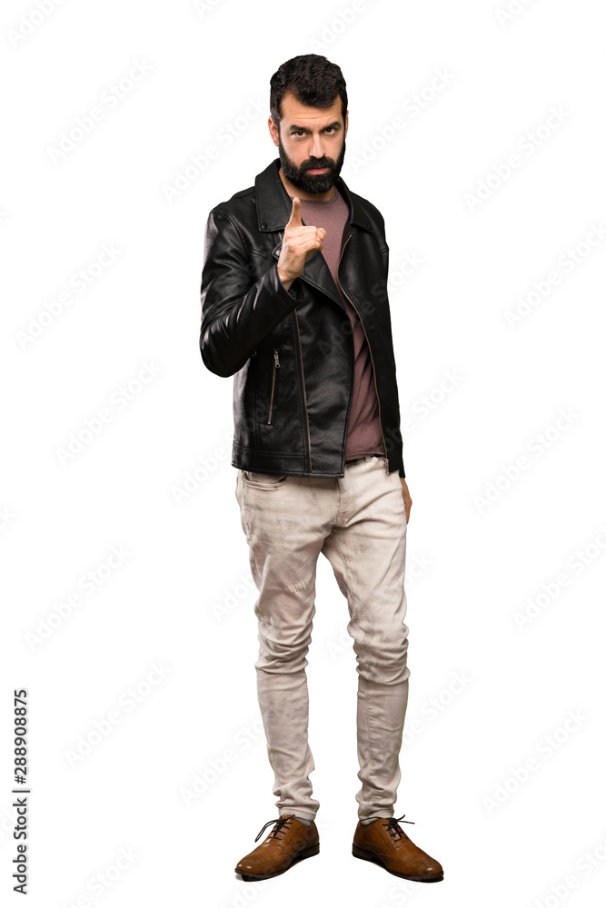 Handsome man with beard frustrated and pointing to the front over isolated white background Handsome man with beard frustrated and pointing to the front over isolated white background