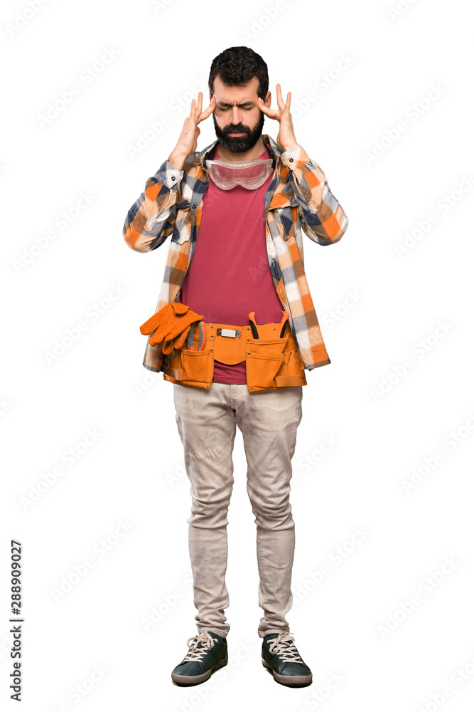 Craftsmen man with headache over isolated white background Craftsmen man with headache over isolated white background