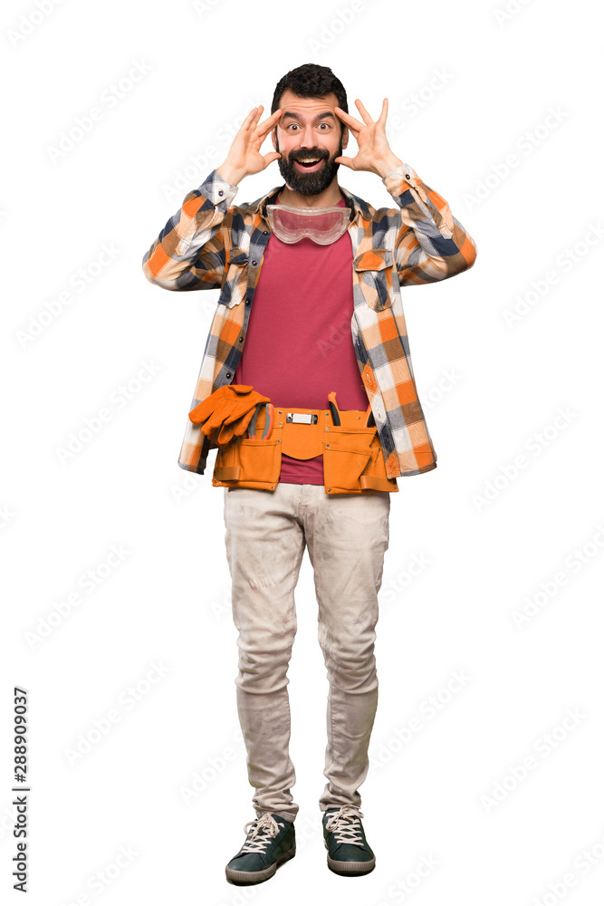 Craftsmen man with surprise expression over isolated white background Craftsmen man with surprise expression over isolated white background