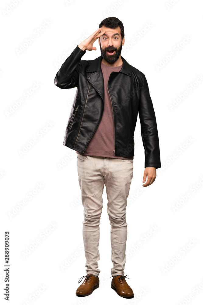 Handsome man with beard has just realized something and has intending the solution over isolated white background Handsome man with beard has just realized something and has intending the solution over isolated white background