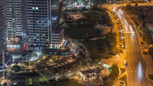 Jumeirah Lake Towers residential district aerial night timelapse near Dubai Marina