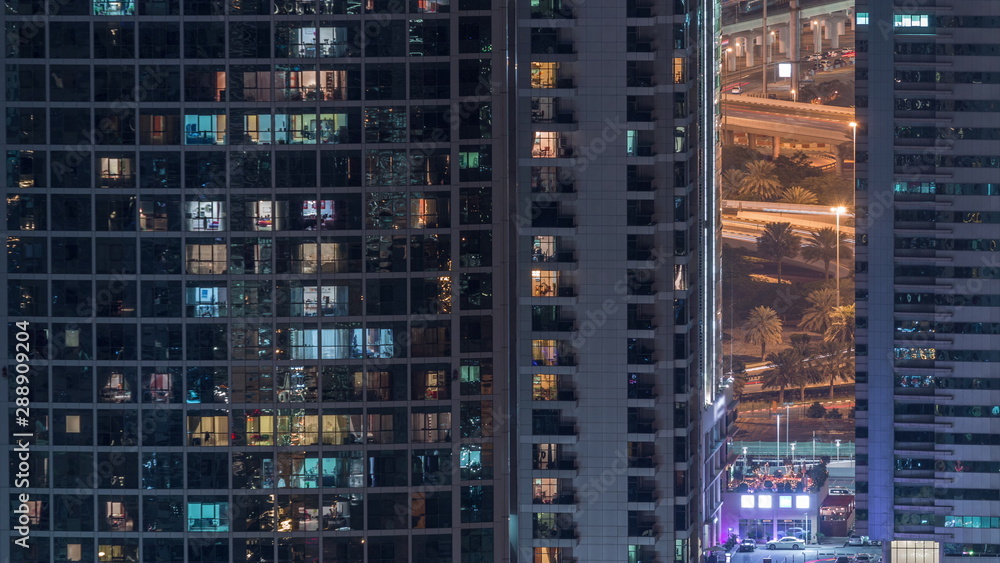 Jumeirah Lake Towers residential district aerial night timelapse near Dubai Marina