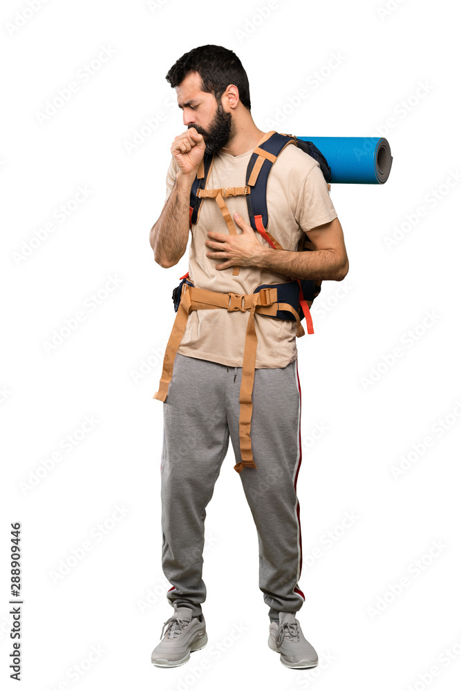 Hiker man is suffering with cough and feeling bad over isolated white background Hiker man is suffering with cough and feeling bad over isolated white background