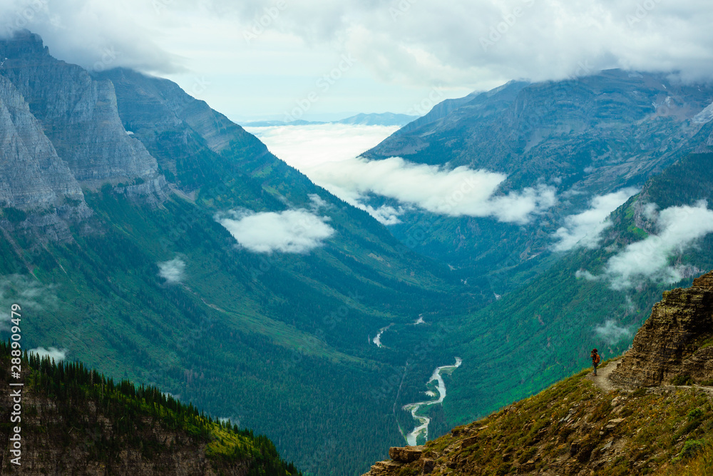 Hiker on mountain in the mountains Hiker on mountain in the mountains