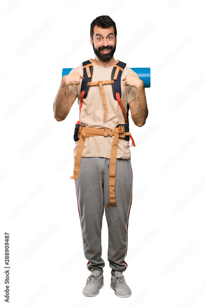 Hiker man with surprise facial expression over isolated white background Hiker man with surprise facial expression over isolated white background