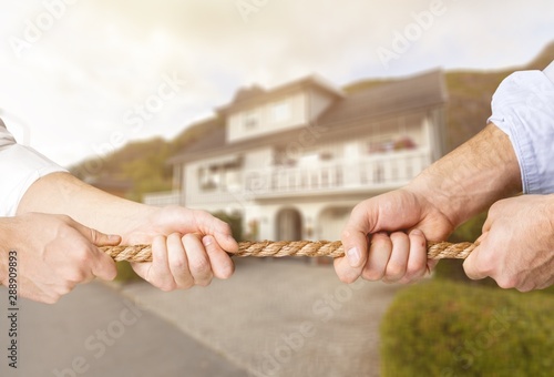 Human hands holding rope from both side isolated on white