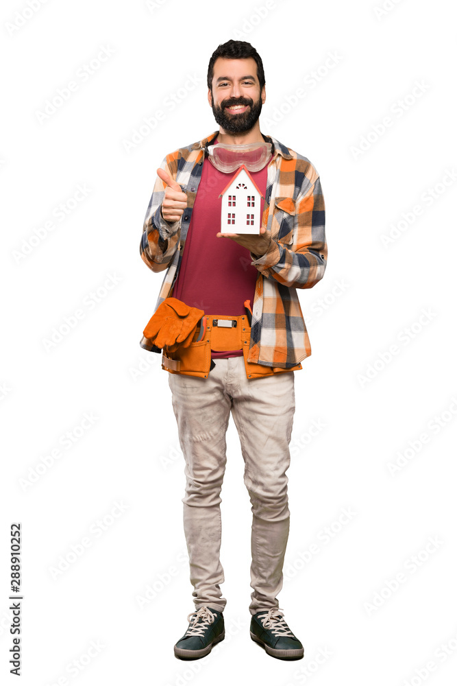 Happy Craftsmen man holding a little house Happy Craftsmen man holding a little house