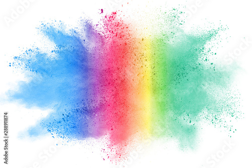 Freeze motion of colorful color powder exploding on white background. Paint Holi. © piyaphong