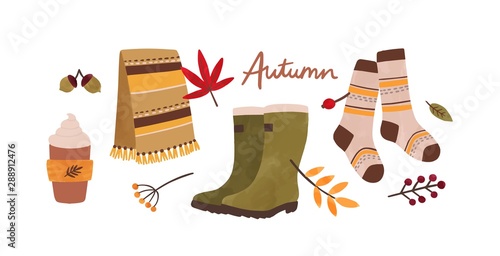 Autumn accessories hand drawn vector illustration. Traditional fall season attributes and typography composition. Foliage, berries warm clothes and creamy drink isolated on white background.
