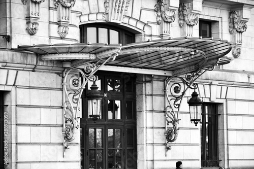 Paris, France - march 10th 2017 : focus on a door on the side of the Orsay Museum, with a glass canopy