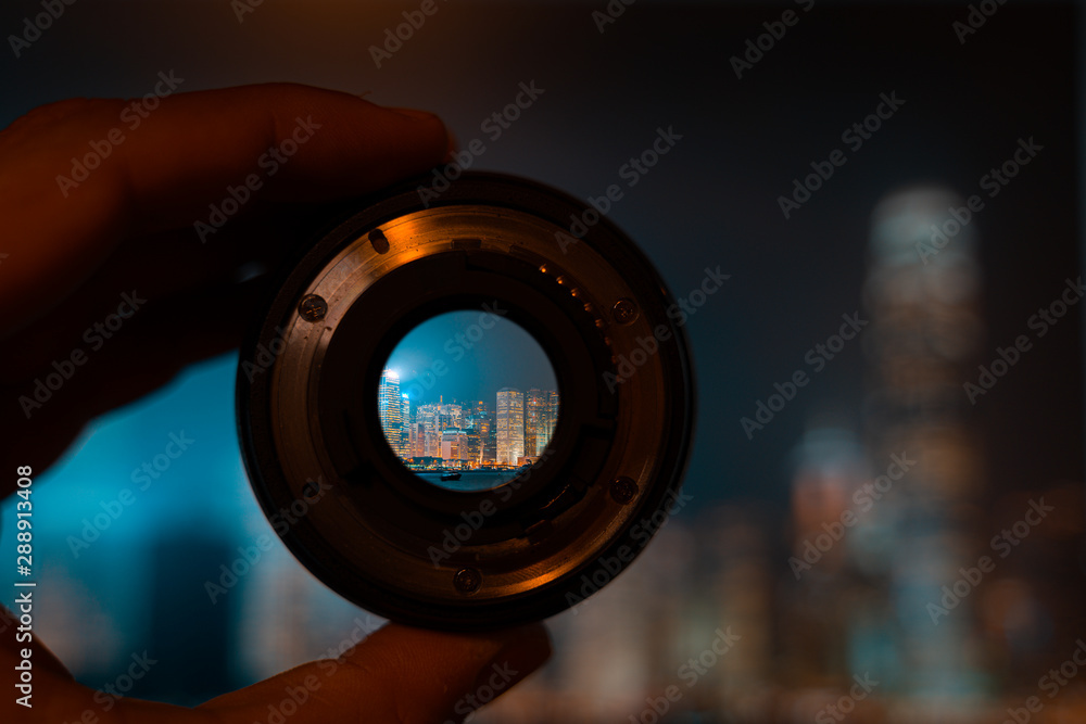 Hong kong night view through camera lens. Photography and travel concept. - obrazy, fototapety, plakaty 