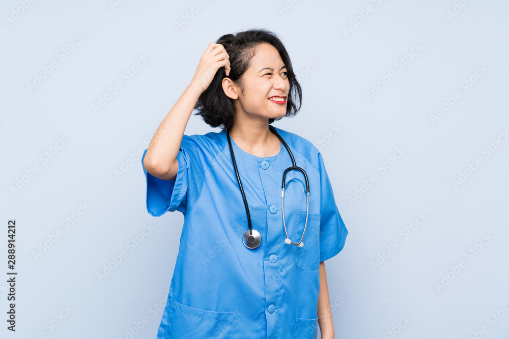 Surgeon doctor woman having doubts and with confuse face expression Surgeon doctor woman having doubts and with confuse face expression